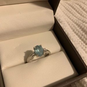 Diamond and light blue topaz sterling ring